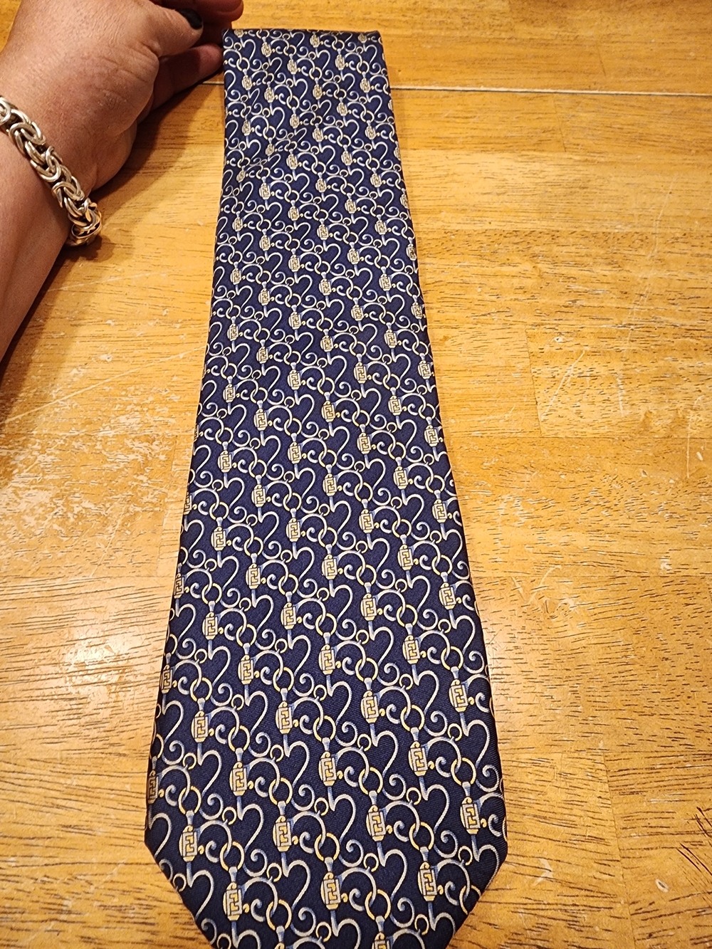 vintage Fendi Cravatte designer tie intricate gold and silver scroll